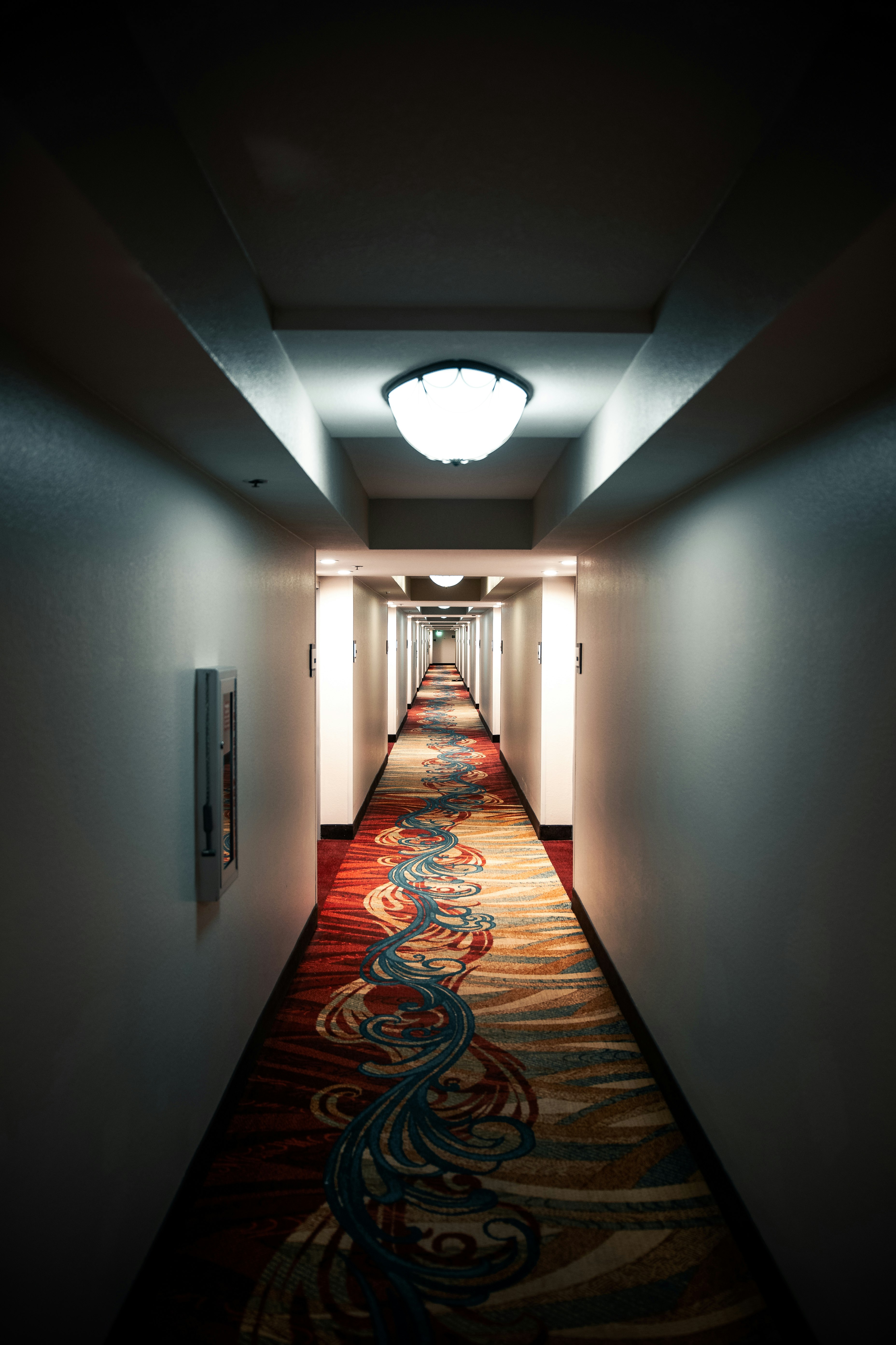 hallway with white wall paint